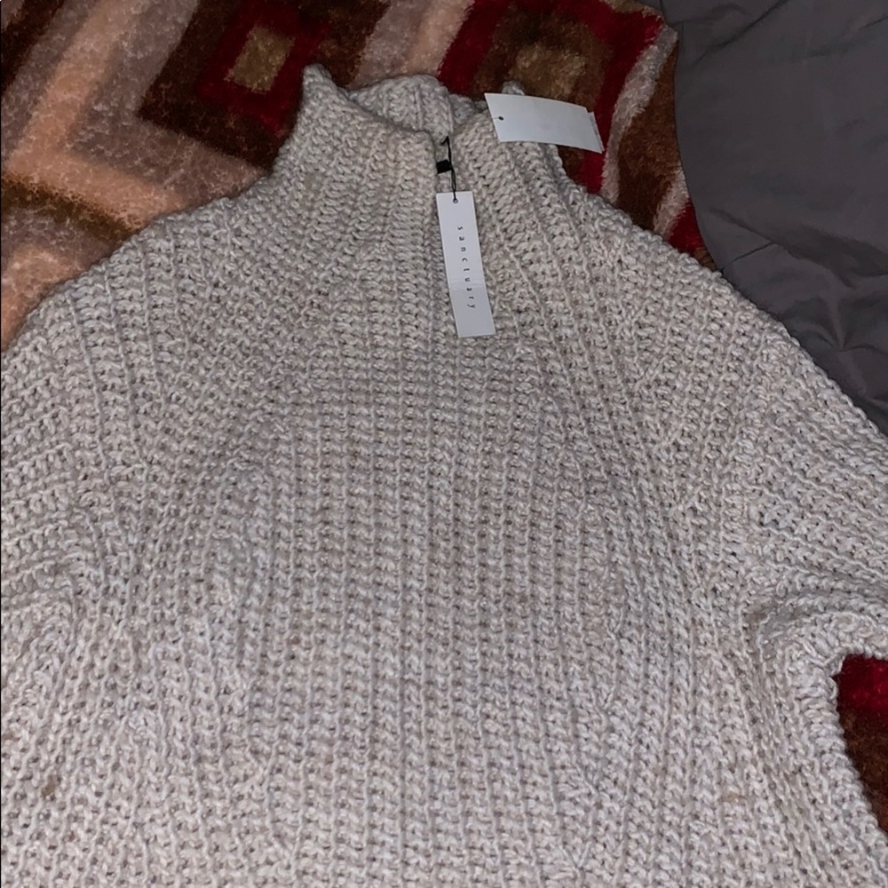 Pullover knitted sweater